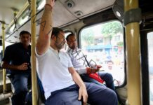 After stop at cobbler’s kiosk and cab ride, Rahul boards a DTC bus, listens to DTC employees woes